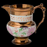 Overall painted copper luster jug with white stipe with flowers.
